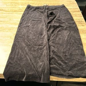 Black velvet, juicy couture, jogging pants, sequin emblem on the rear.